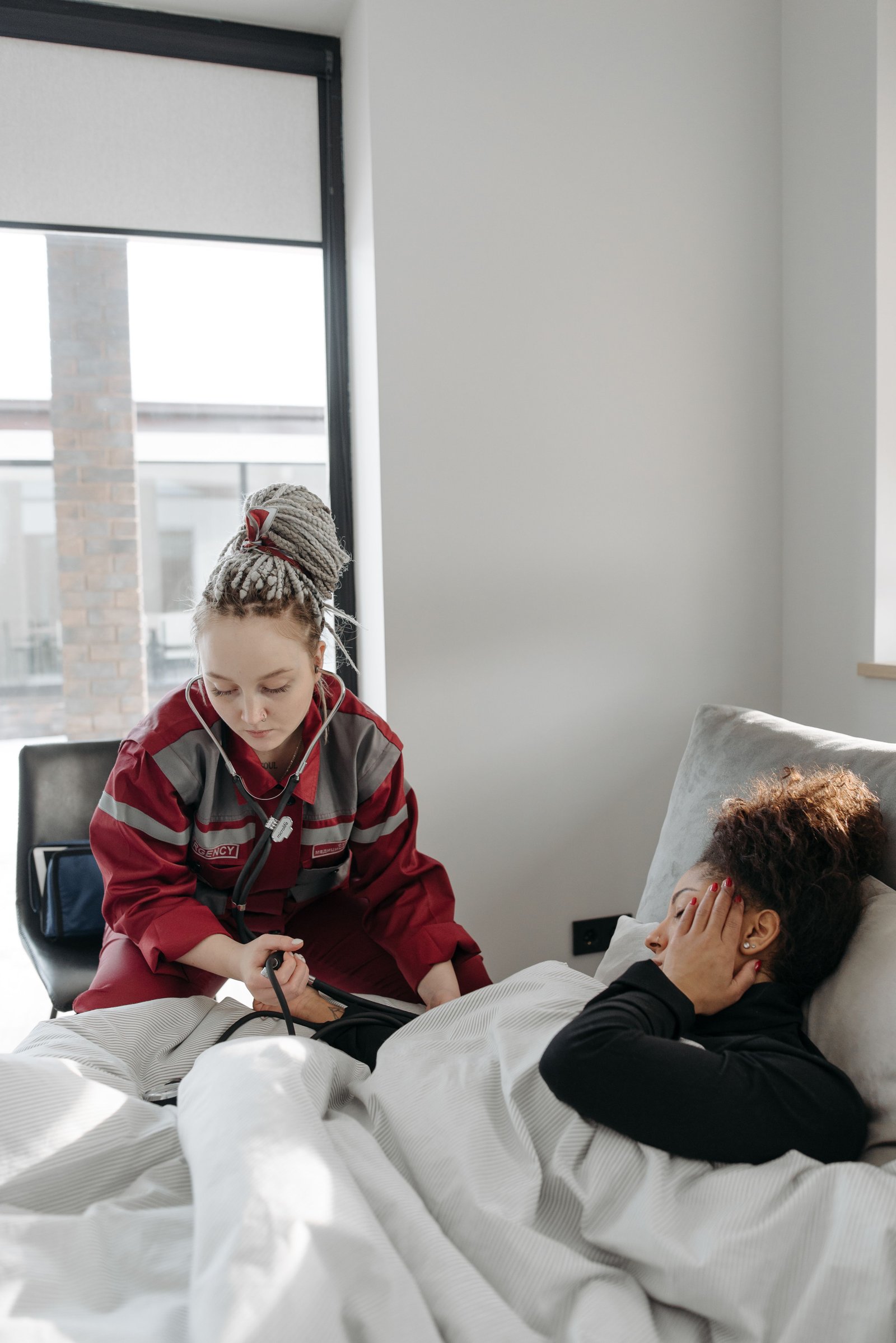 Person resting in bed during recovery
